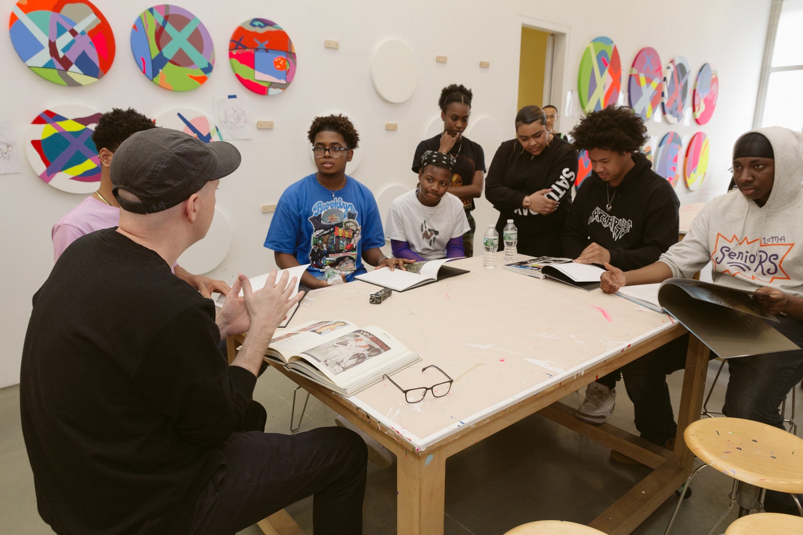 Artist Kaws creating artwork in his studio